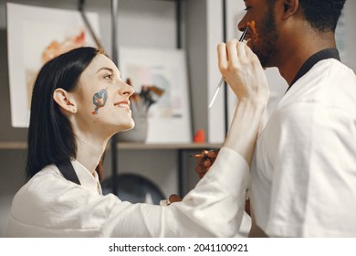 Mixed Couple Painting Picture In Workshop