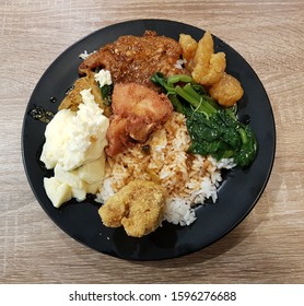 Mixed Economy Rice With Pork Cutlet Fried Chicken Steamed Egg And Vegetables