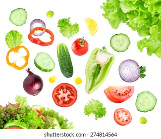 Mixed Falling Vegetables On White Background. Fresh Salad