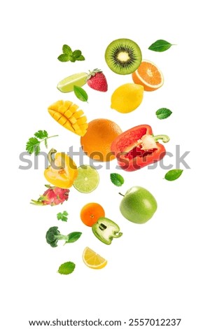 Mixed Fresh fruits with vegetable and leaves falling isolated on white background.