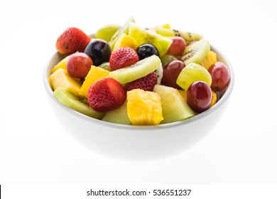 Mixed fruit in white plate isolated on white background - Healthy food style - Shutterstock ID 536551237