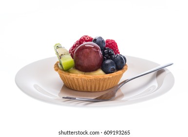 mixed fruits danish on white plate with fork isolated on on white background. - Shutterstock ID 609193265