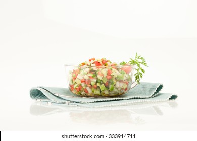 Mixed Green Salad In Glass Bowl