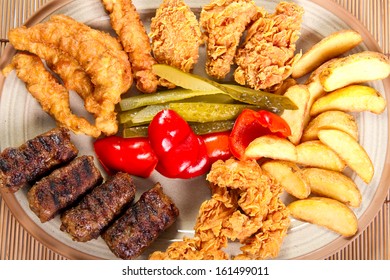 Mixed Grilled And Fried  Meat Platter And Pickles