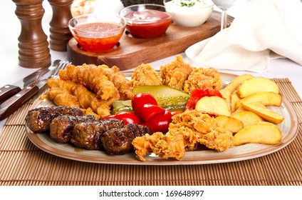 Mixed Grilled And Fried  Meat Platter And Pickles