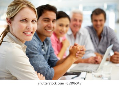 Mixed group in business meeting - Powered by Shutterstock