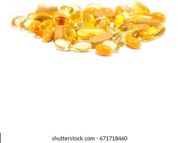 Mixed Healthy Dietary Supplement Tablets and Capsules : Vitamin E 400 IU, Vitamin C 1000 mg, Coenzyme Q10 (ubiquinone, ubidecarenone) 100 mg, Fish Oil 1000 mg - isolated on white