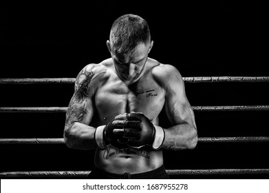 Mixed martial artist posing on a black background. Concept of mma, ufc, thai boxing, classic boxing. Mixed media