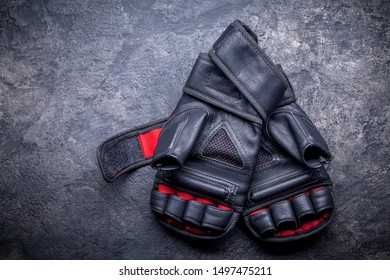 Mixed Martial Arts Black Gloves On Gray Background