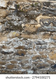 A mixed medium wall of substantial age