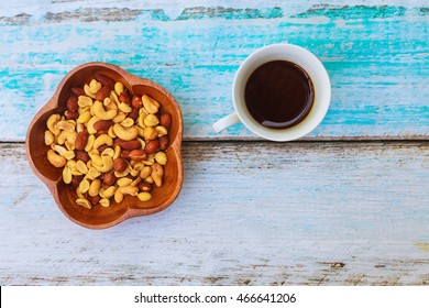 Mixed nuts Delicious nuts to your sweets Nuts mix in a cup of coffee