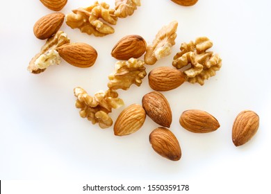 Mixed Nuts On White Background, Almonds And Walnuts