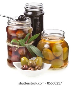 Mixed pickled olives with spices  on a white background - Powered by Shutterstock