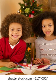 Mixed Race Children Making Christmas Cards