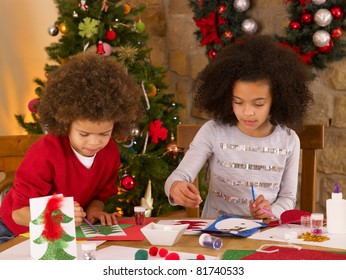 Mixed Race Children Making Christmas Cards