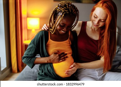 Mixed Race Couple Awaiting A Baby In Room