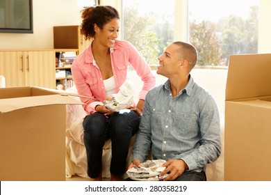 Mixed Race Couple In New Home