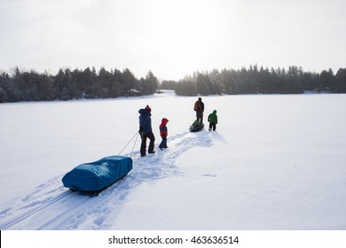 Mixed Race Family Going Ice Fishing 