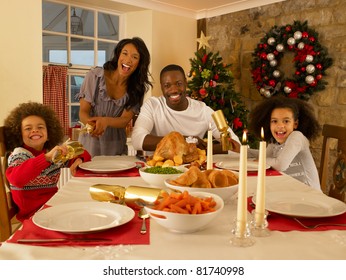 Mixed Race Family Having Christmas Dinner