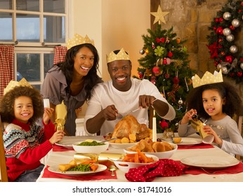 Mixed Race Family Having Christmas Dinner