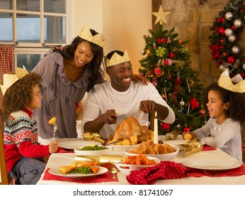 Mixed Race Family Having Christmas Dinner