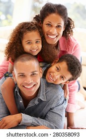 Mixed race family at home