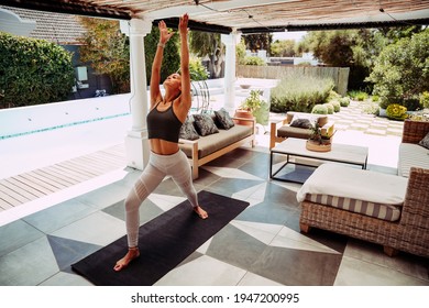 Mixed Race Flexible Teen Stretching Back Exercising Yoga Outside Home