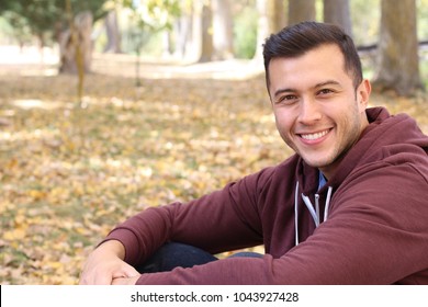 Mixed Race Male Smiling In The Fall With Copy Space