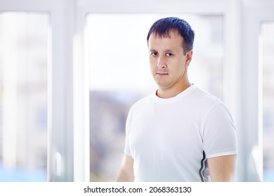 Mixed Race Man 38 Years Old Stands At Home.