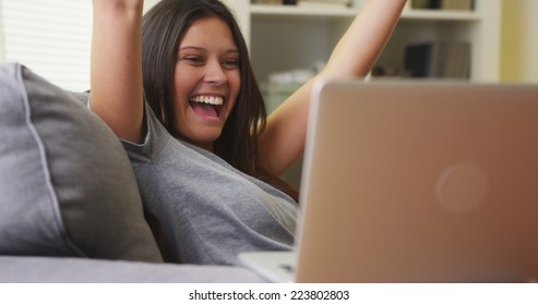 Mixed Race Woman Excited And Happy About Her Team Winning