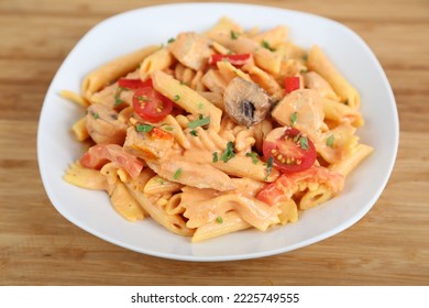 Mixed Rosa Chicken Pasta With Tomato And Olive Served In A Dish Isolated On Table Side View Of Middle East Food