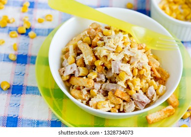 Mixed Salad From Ham, Cheese, Boiled Egg,  Canned Corn And Bread Crusts With Mayonnaise Dressing For Easter Dinner