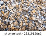Mixed sea gravels. River gravels background.