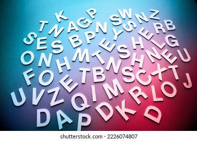 Mixed solid letters pile closeup photo. Education background concept