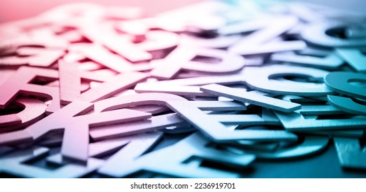 Mixed solid letters pile closeup photo. Education background concept