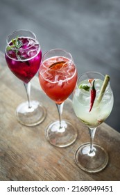 Mixed Spritzer Wine Cocktails Selection With Fruit In Outdoor Bar Table