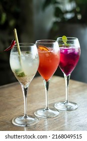 Mixed Spritzer Wine Cocktails Selection With Fruit In Outdoor Bar Table