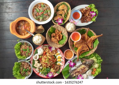 Mixed Thai Isan Food On Black Table