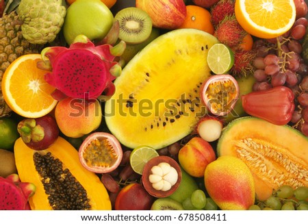 Mixed tropical fruits, fresh fruits background