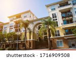 Mixed use commercial real estate building with apartments and business offices - Palm Trees and Sky - Real Estate Class A