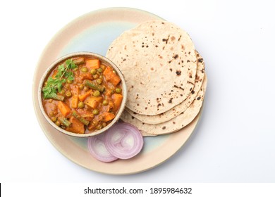 Mixed Veg Curry Made From Beans, Carrot, Potato With Roti Or Chappati On A Plate, Indian Food