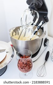 Mixer Bowl Of Whipped Cream. White Kitchen Background. Homemade Culinary Concept. Mixing, Whipping Cream For Cake. Concept Of Confectionery, Cooking Desserts And Kitchenware, Homemade Culinary.