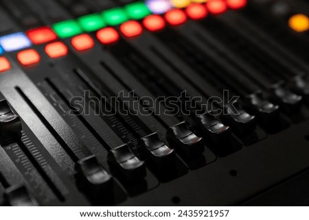 Mixer control. Music engineer. Backstage controls on an audio mixer, Sound mixer. Professional audio mixing console with lights, buttons, faders and sliders. sound check for concert.