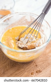 MIxing Baking Ingredients In A Bowl For Cake Or Pancakes. Light Food Photography Concept