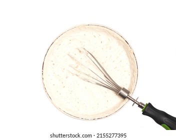 MIxing Baking Ingredients In A Bowl,top View Isolated On White Background.