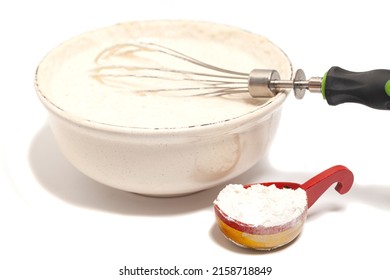 Mixing Baking Ingredients Isolated On White Background.