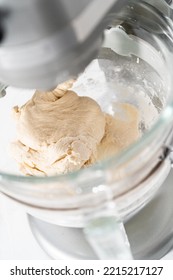 Mixing Bread Dough In A Stand-alone Kitchen Mixer To Bake Patriotic Cinnamon Twists.