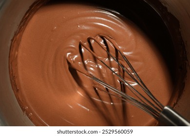 Mixing chocolate dough with whisk, top view - Powered by Shutterstock