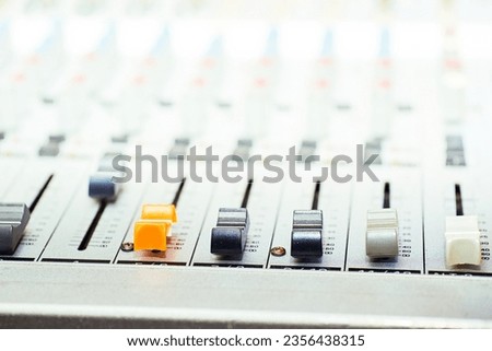 Mixing console for controlling the volume, frequencies of musical instruments                              