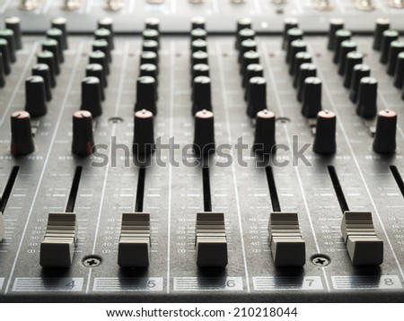 Mixing desk, back lit,  , for music and sound , entertainment themes